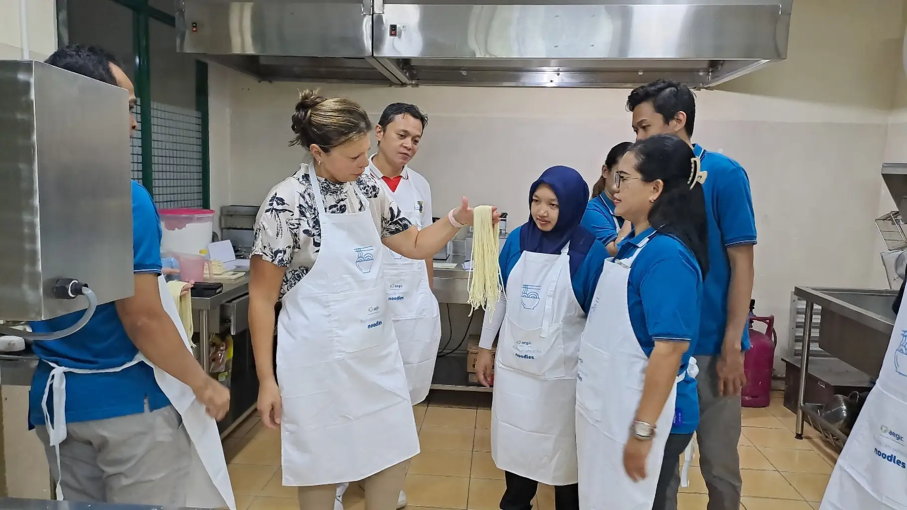 People looking at noodles