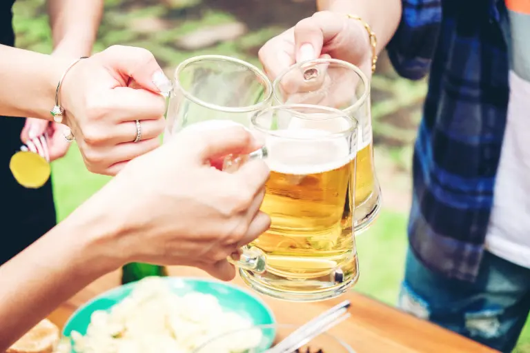 people drinking beer made from barley